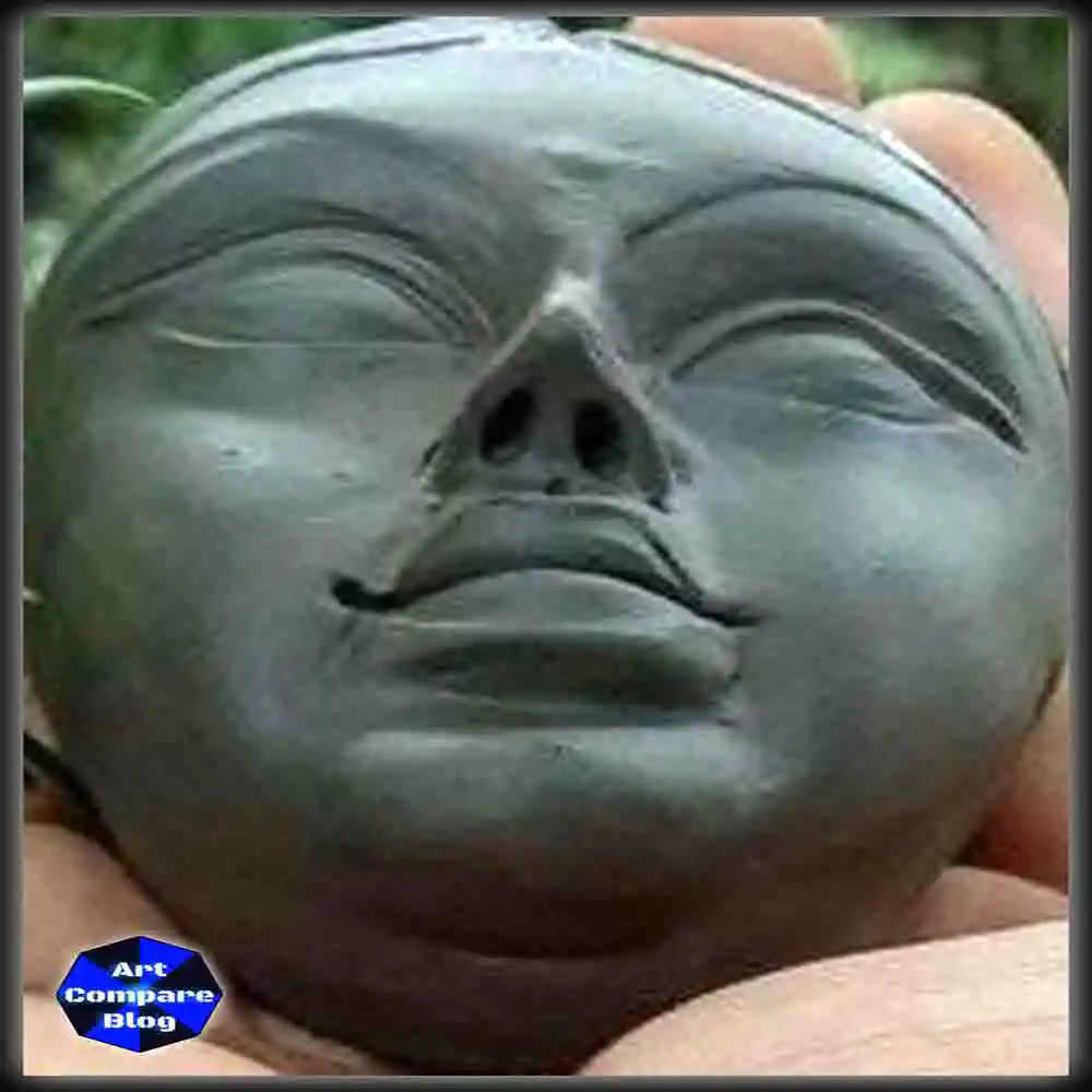 Handmade Clay Sculpture of a Serene Face