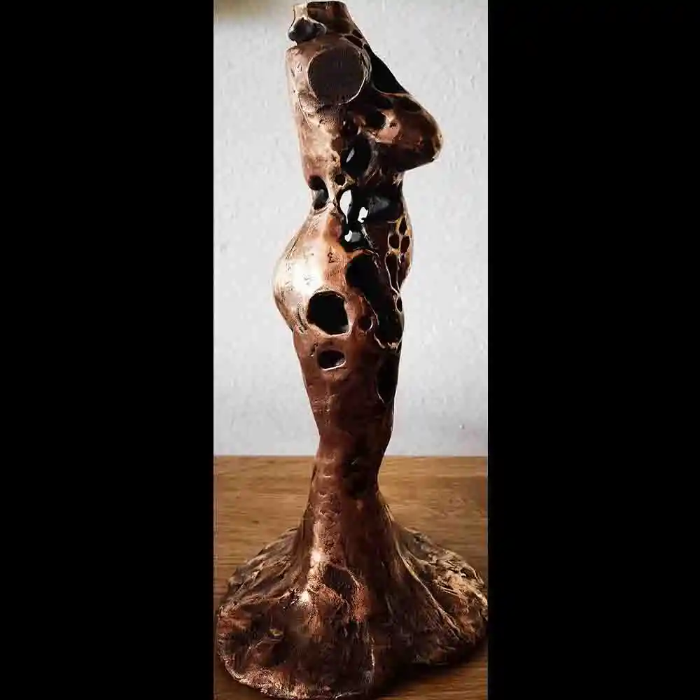 Eroded Bronze Side Torso Sculpture