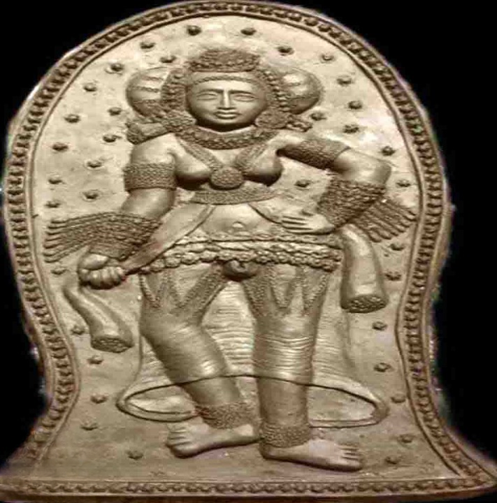 Ancient Relief Sculpture of a Divine Figure-1