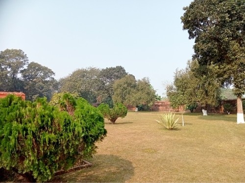 Manicured Greens Meet Ancient Wall