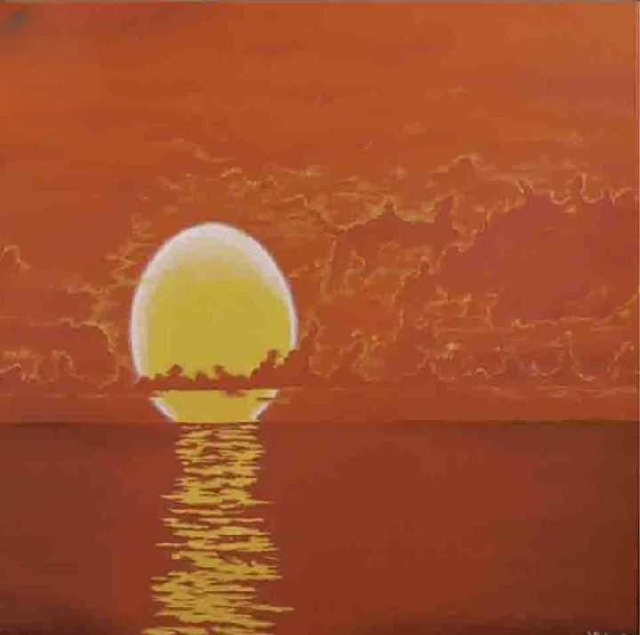 Golden Sun Setting Over Calm Ocean-1